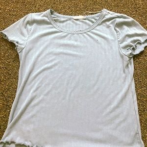 Blouse it’s ruffles it’s a size large